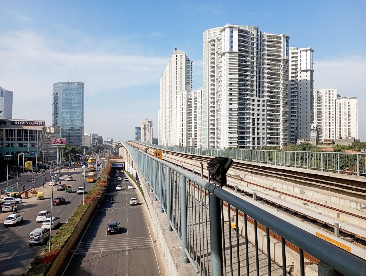 Gurgaon IT corridor with office towers and metro connectivity