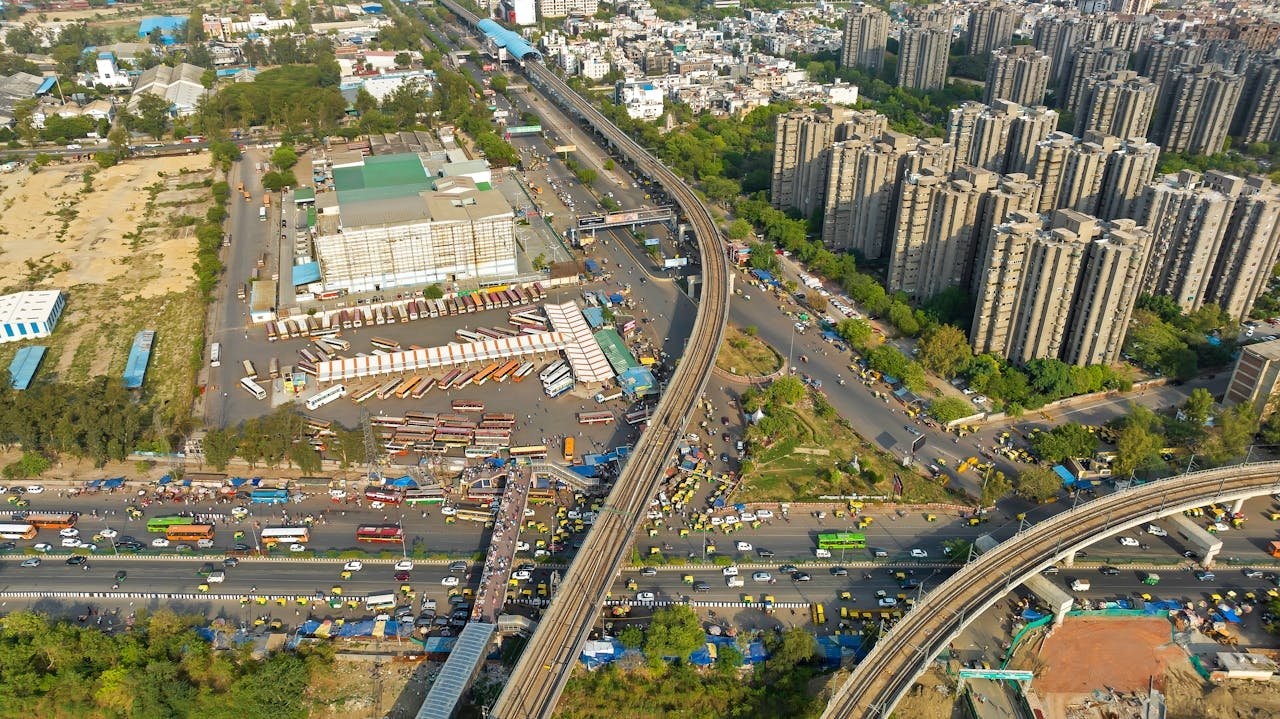 Real estate growth around a metro station with residential towers and commercial activity